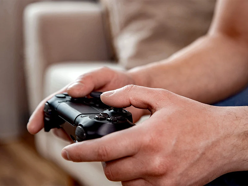 Black controller for game consoles, which was produced from masterbatch compounds.