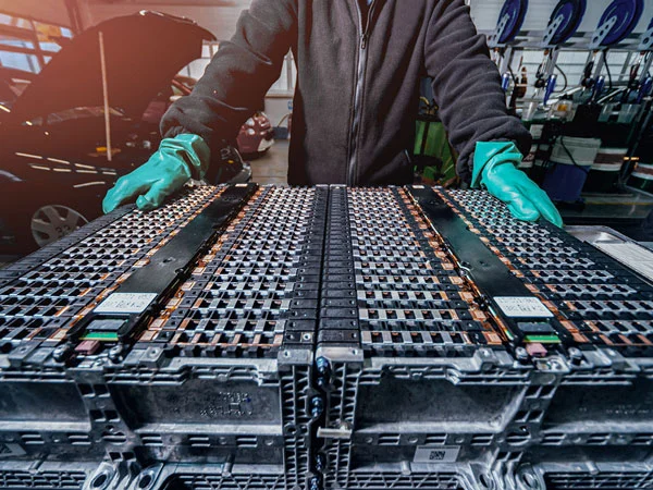 Battery system cathode made out of battery mass from a BUSS compounding system