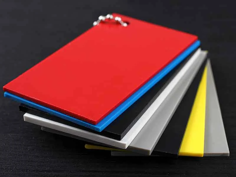 Thin plastic cards made from a substrate produced using BUSS calender processing systems