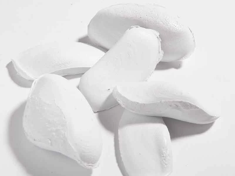 White raw mixture pieces for calender processing systems from BUSS