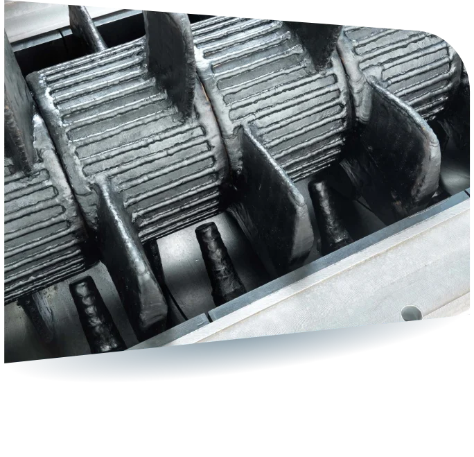 Detailaufnahme der KX-Schnecke mit ihrer einzigartigen vierflügeligen Schneckengeometrie, die optimiert ist für die Compoundierung von Anodenmassen.