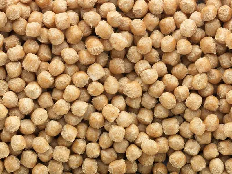 Brown NFC compound granulate, after preparation with a BUSS compounder