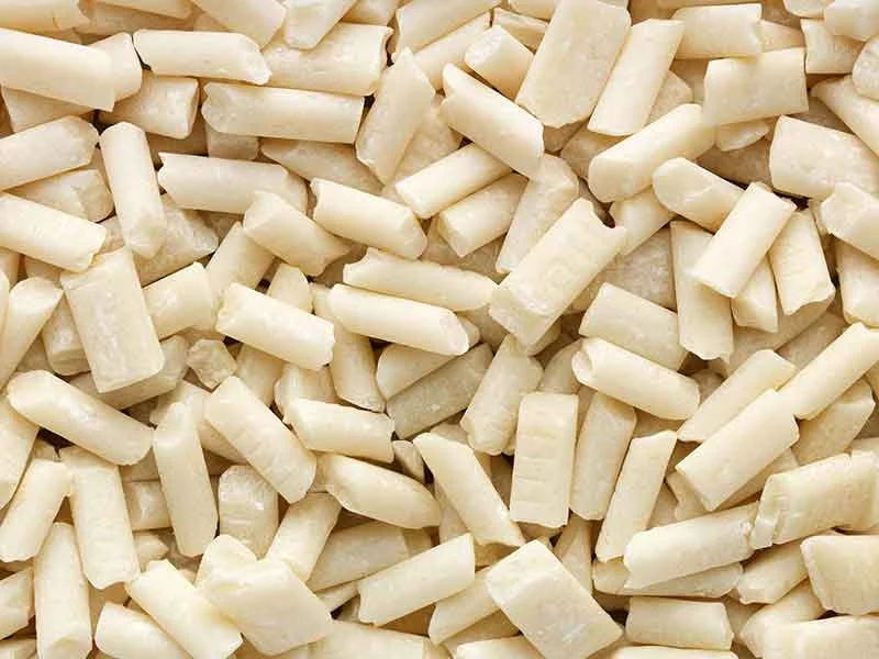 White gum base pellets from a PIB gum base compounding plant